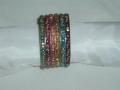 Fancy Indian metal lakh bangle / kada for adults. The kada has fancy multi colored work. <br> Diameter is 6.5 cms (aka 2/8 inches). The price is for each bangle. <br>
Available in different colors.