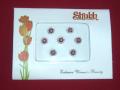 Tell me more about Round maroon fancy bindis with clear stones (BISH01005)