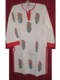 Long white cotton kurta with block print and self design.  The red, green and blue flower shaped block print is all over the kurta.  Side vents and full sleeves.  Will keep you cool and comfortable in the summer heat.  The length of this kurta is slightly above the knees.  Looks very chic worn over jeans.