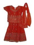 Orange lehenga choli in georgette.  The choli is orange with heavy work all over using zari and sequins.  The choli has hooks in the back.  The flared skirt is orange with heavy zari & sequins work all over.  The dupatta has similar zari and sequins work all over.  Sizes available for kids 2 years old and up.