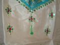 South Indian pattu pavada in tan and green color (PV32520)
