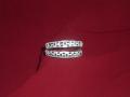 Tell me more about Pair of silver bangles/kada with mina work for kids (SB14007)