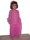 Tell me more about Pant-style salwar kurta in pink w/ bell sleeves (SS2012)